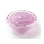 Puple cream cheese in a small glass bowl